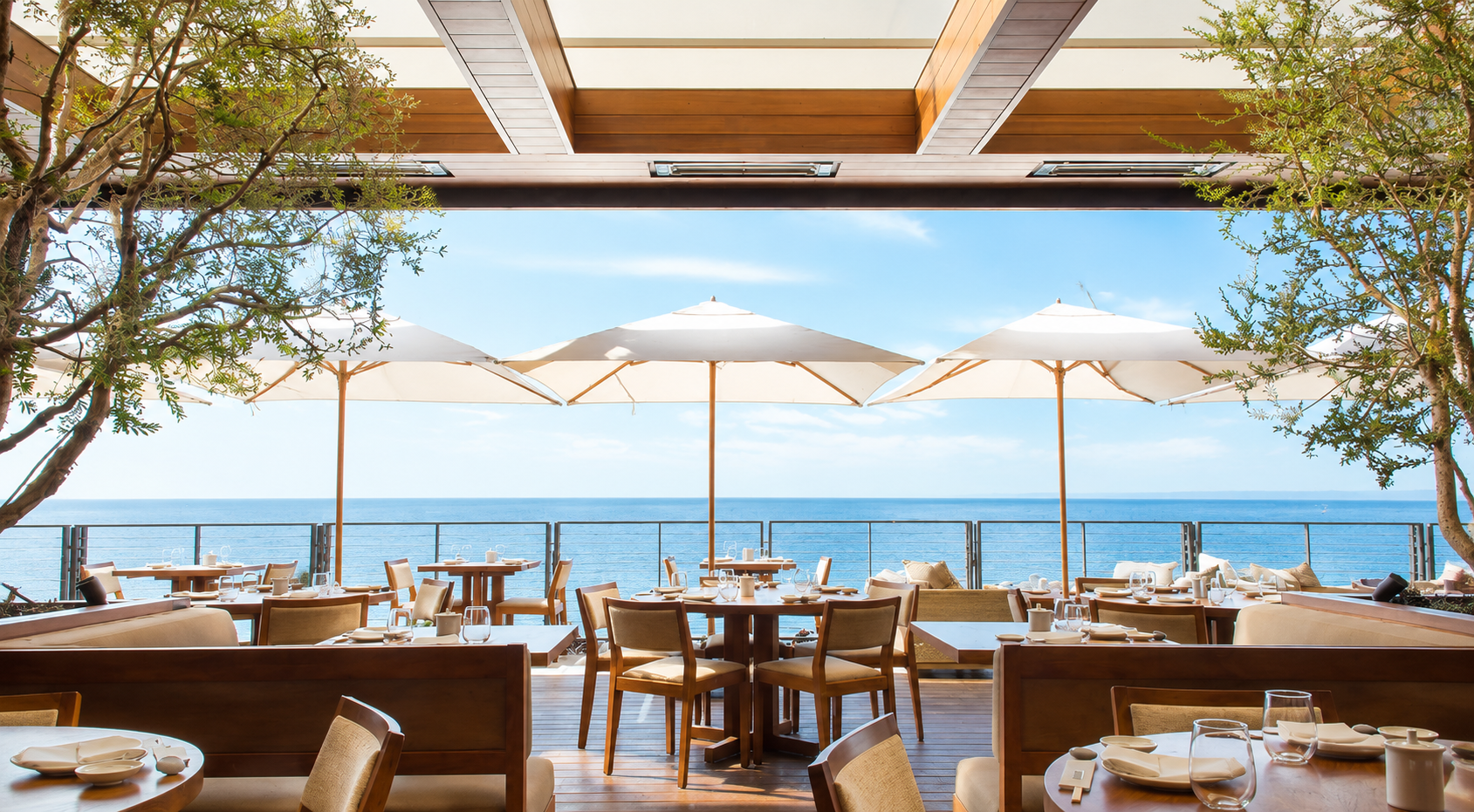 Open-air terrace dining with ocean views